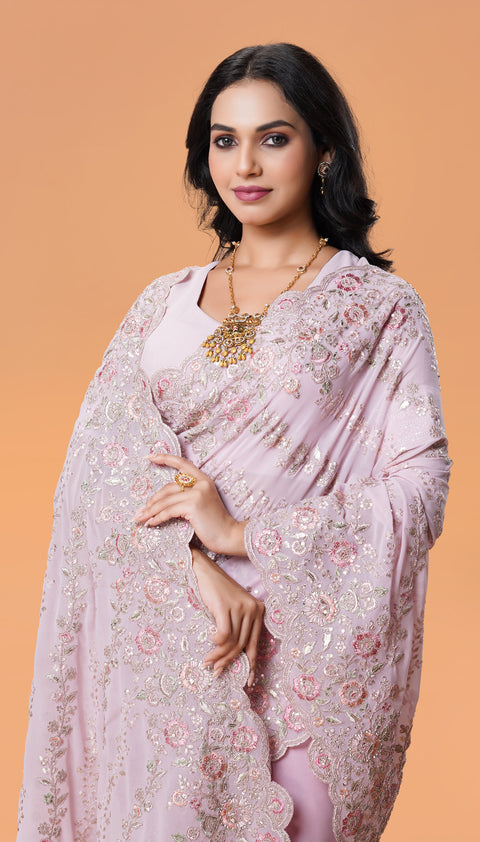 Flawless Pink Georgette Saree with Artistic Zari Embroidery