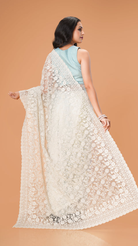 Graceful Lucknowi Net Saree Adorned with Sparkling Stones ( not in excel sheet ) in drive only