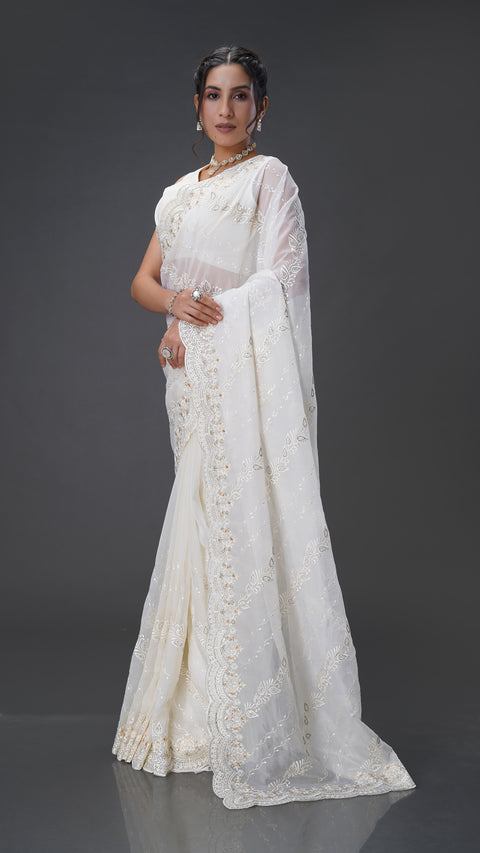 Graceful Cream Organza Saree with Stunning Stone Embellishments